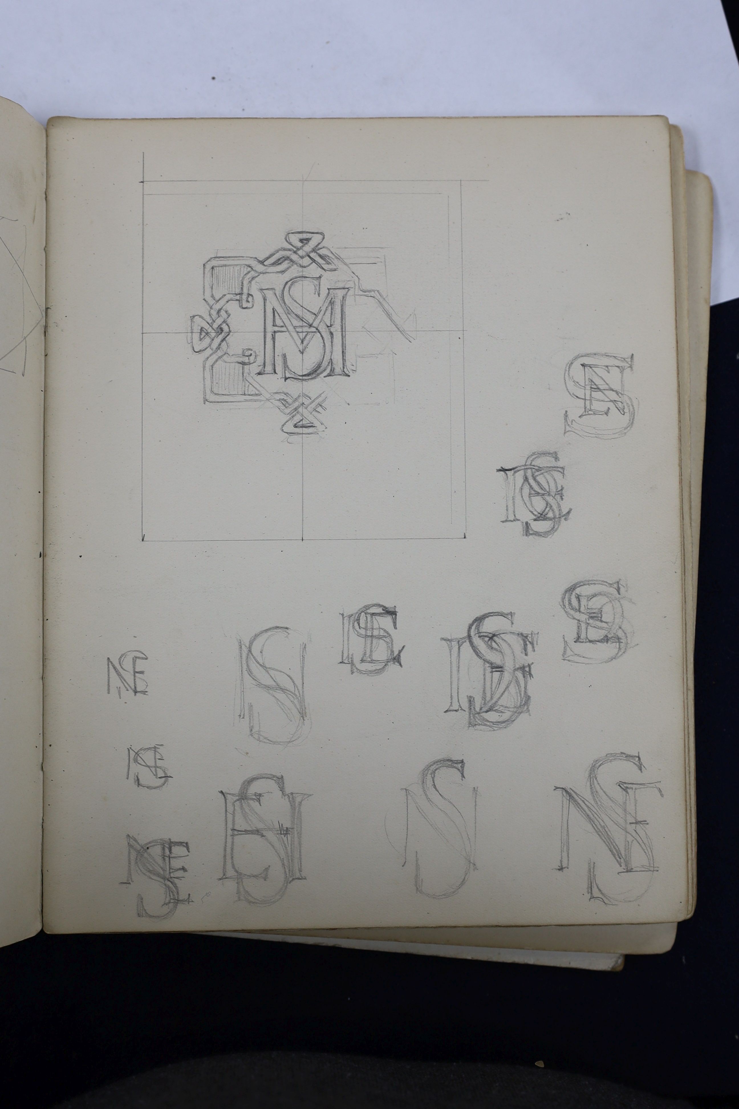 Five various sketch books, an exercise book containing miscellaneous crests and a photograph album